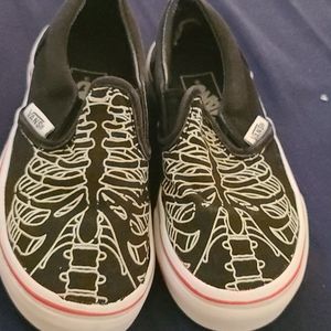 Vans skeleton ribcage slip ons